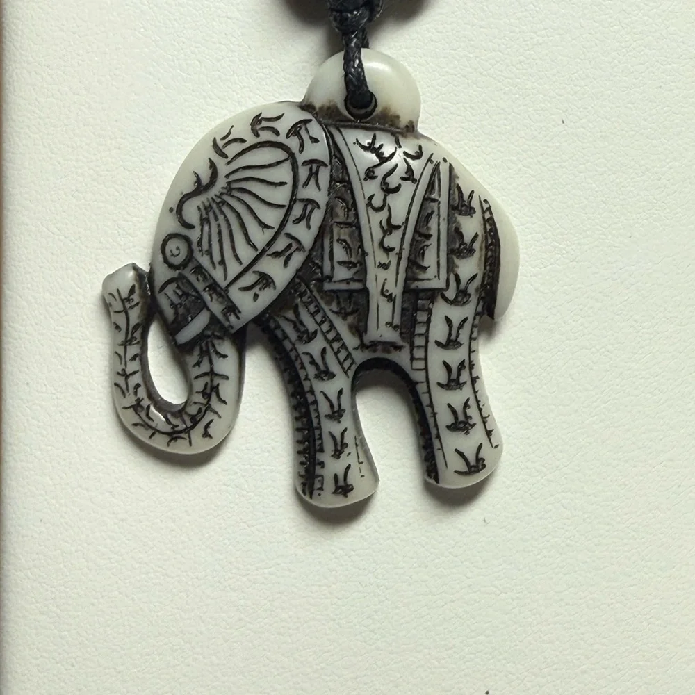 Carved Elephant Pendant Necklace